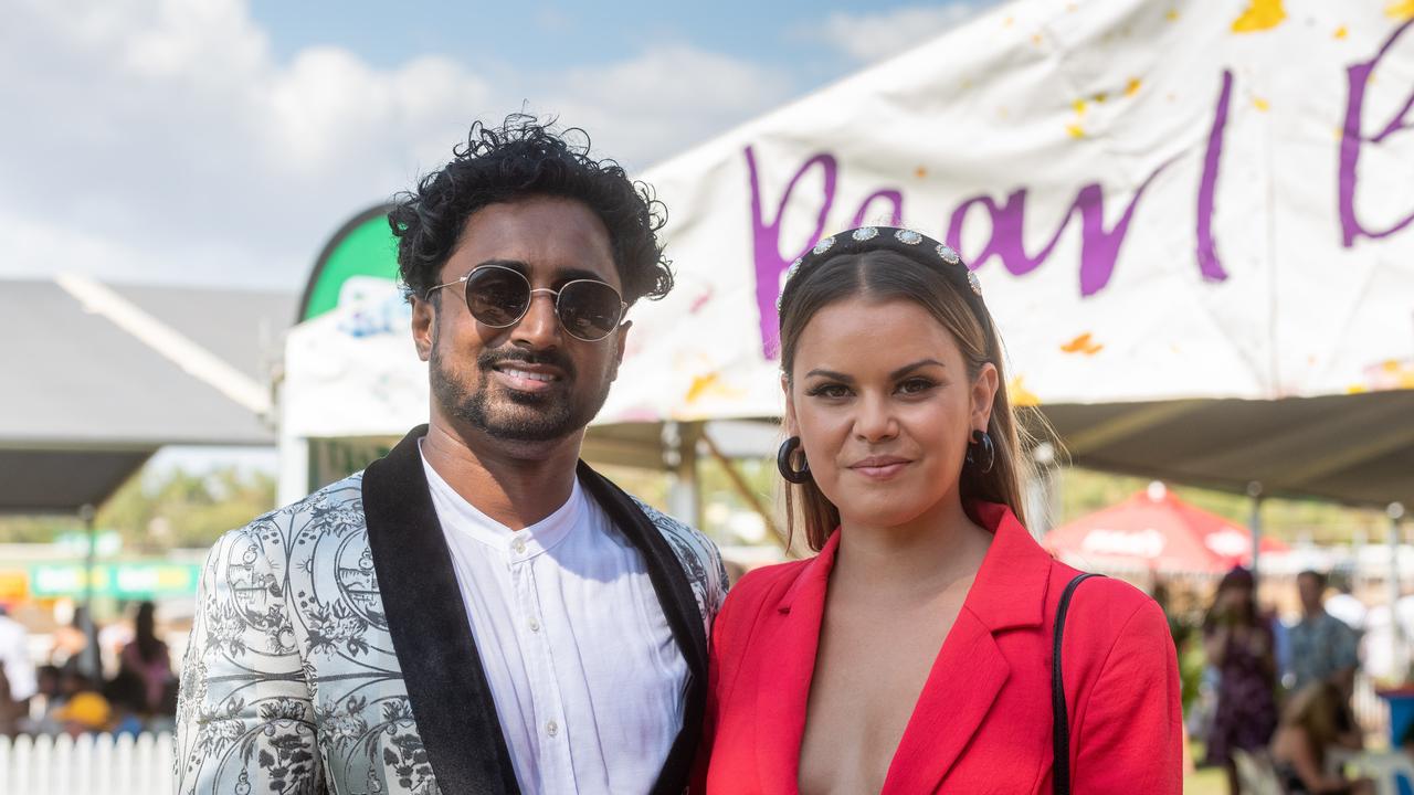 Bachelor in Paradise contestants Niranga Amarasinghe and Renee Barrett enjoy the Darwin Carnival. Picture: Che Chorley