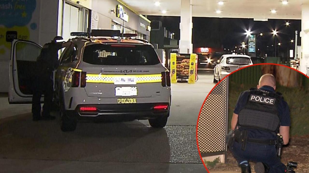 An ambulance crew filling up at a Tapleys Hill Road service station sprung into action after a stabbing victim approached them and asked for help. Picture: 7NEWS