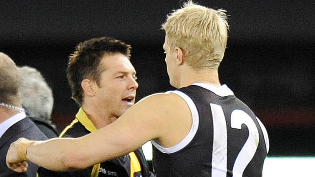 Riewoldt and Cousins chat after a Richmond v St Kilda match.