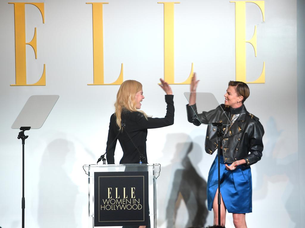 The Oscar-winners shared a high-five on stage. Picture: Getty Images