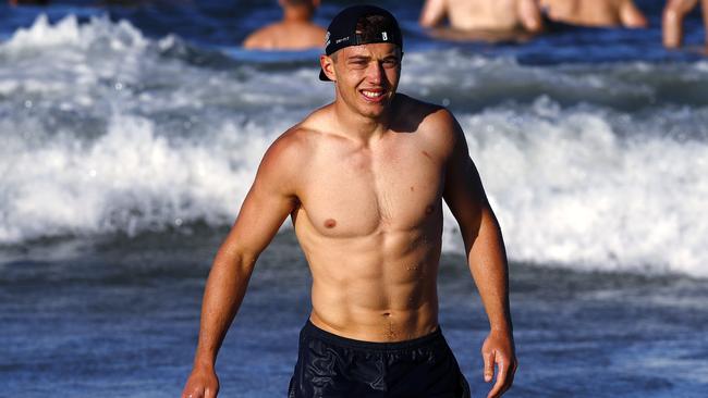 Patrick Cripps enjoys the surf in Queensland. Pic: Michael Klein