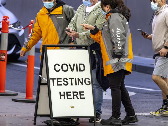 MELBOURNE, AUSTRALIA - NewsWire Photos October 10, 2021: People queue for Covid testing in Bourke St in Melbournes CBD.Picture: NCA NewsWire / David Geraghty