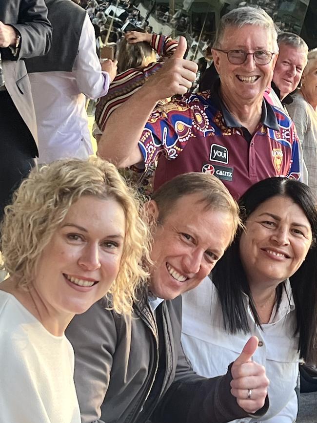 Queensland government ministers Steven Miles (centre front) and Grace Grace (front right) at the Brisbane Lions vs. Carlton Blues preliminary final at the Gabba on September 23, with their partners Kim (front left) and Michael (back). Picture: Supplied