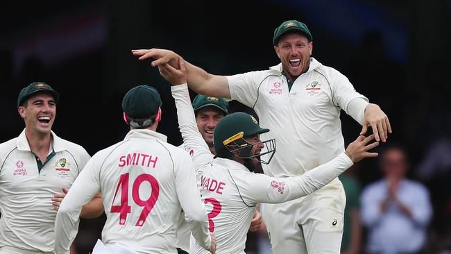 James Pattinson takes a catch for Australia at the SCG. Picture: Brett Costello