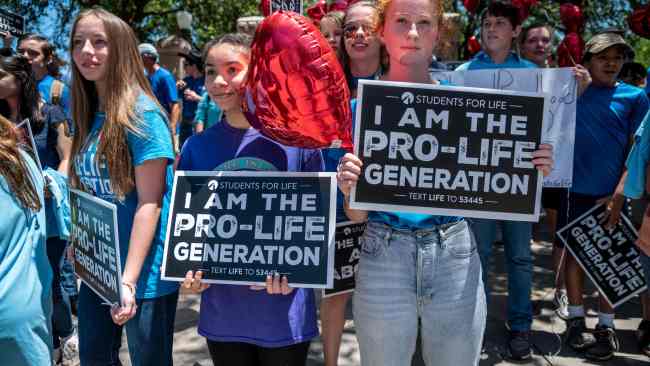 Pro-life protesters at the same place, on the same day. Picture: Sergio Flores/Getty Images