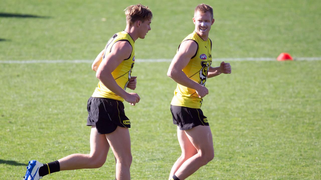 Lynch runs alongside new teammate Jack Riewoldt. Picture: Sarah Matray