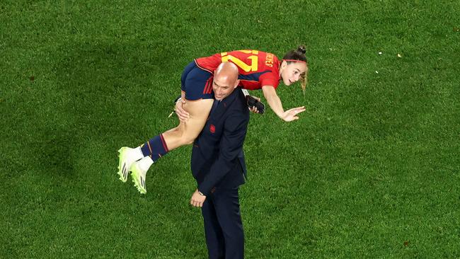 Luis Rubiales hoists Spain's Athenea del Castillo Beivide over his shoulder. Picture: David Gray