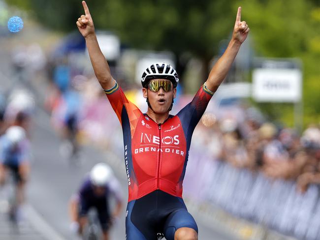 Luke Plapp celebrates after crossing the line to win back-to-back national men's road race titles at the Road Nationals in Ballarat. Photo by Con Chronis/AusCycling.