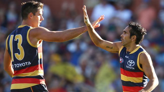 Taylor Walker and Eddie Betts celebrate a goal against Fremantle.