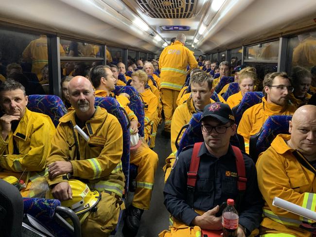A busload of CFS volunteers head over to Kangaroo Island from the mainland on January 4 to help fight the bushfire. Picture: Leon Bignell