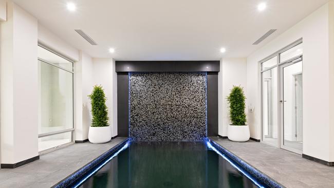 The indoor spa pool with water feature. Supplied by Williams Real Estate.