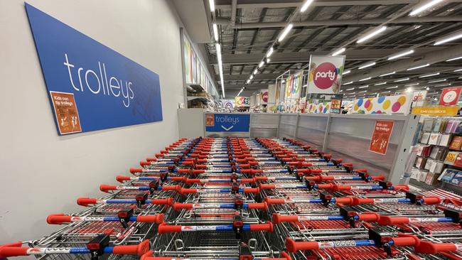 Chained up coin-operated Kmart trolleys.