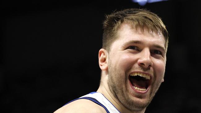 MINNEAPOLIS, MINNESOTA - MAY 30: Luka Doncic #77 of the Dallas Mavericks reacts after drawing a foul during the third quarter against the Minnesota Timberwolves in Game Five of the Western Conference Finals at Target Center on May 30, 2024 in Minneapolis, Minnesota. NOTE TO USER: User expressly acknowledges and agrees that, by downloading and or using this photograph, User is consenting to the terms and conditions of the Getty Images License Agreement. (Photo by David Berding/Getty Images)