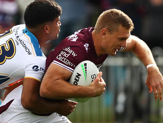 MUDGEE, AUSTRALIA - APRIL 17: Tom Trbojevic of the Sea Eagles is tackled during the round six NRL match between the Manly Sea Eagles and the Gold Coast Titans at Glen Willow Sporting Complex, on April 17, 2021, in Mudgee, Australia. (Photo by Mark Metcalfe/Getty Images)
