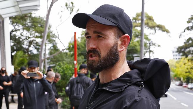 WEEKEND TELEGRAPH - 26.1.24UNTIL MUST NOT PUBLISH  BEFORE CLEARING WITH PIC EDITOR  - Members from the Neo Nazi group NSN are moved on by police at North Sydney after they tried to go to the city to protest. Leader of the group Thomas Sewell pictured.  Picture: Sam Ruttyn