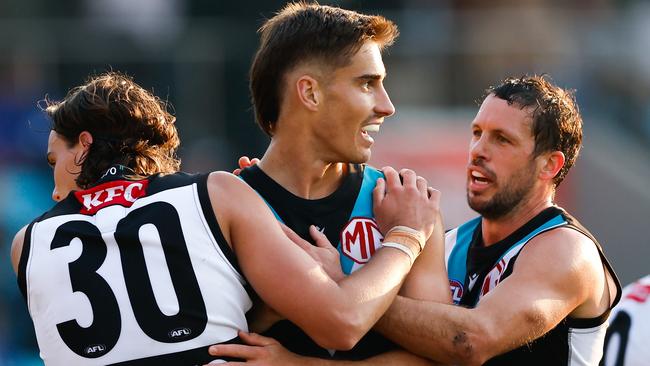 HOBART, AUSTRALIA - MAY 13: Brynn Teakle of the Power celebrates a goal with teammates during the 2023 AFL Round 09 match between the North Melbourne Kangaroos and the Port Adelaide Power at Blundstone Arena on May 13, 2023 in Hobart, Australia. (Photo by Dylan Burns/AFL Photos via Getty Images)