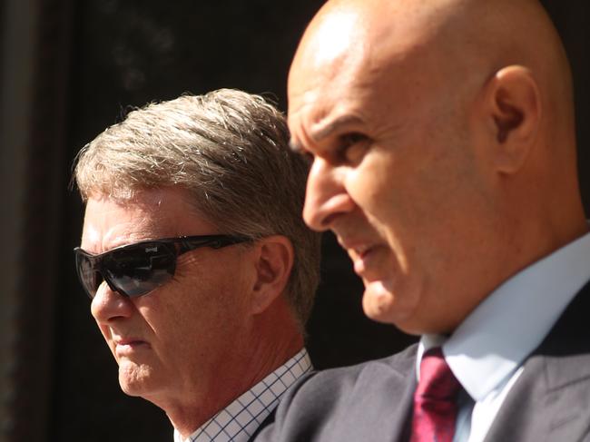 Craig Cooke left and lawyer Danny Eid outside court. Picture: John Grainger