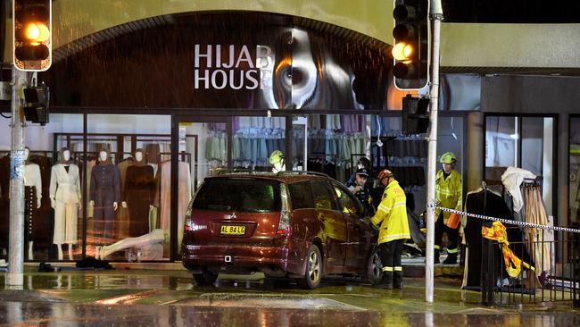 Nassar’s car being removed from a shop after it crashed through the front windows of the shop. Picture: AAP