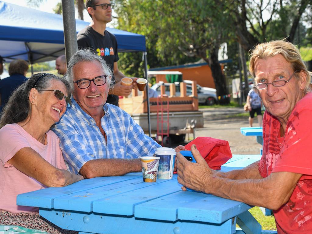 Friends Irene Hammond, Mel Edwards, and Trevor Calder having a ball at the Lismore Farmers Markets.