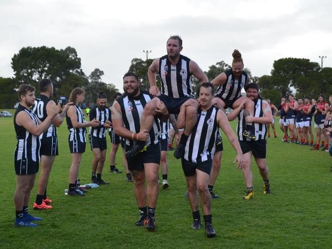 Salisbury player Sean Poysden is chaired off last season. Picture: Salisbury Football Club