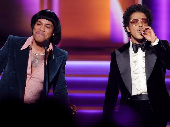 Anderson .Paak and Bruno Mars of Silk Sonic accept the Record Of The Year at the Grammys. Picture: Getty Images