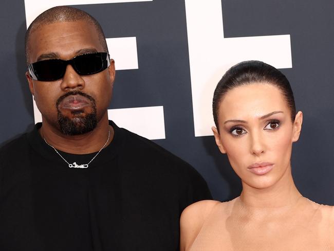 PIXELATED VERSIONS -  LOS ANGELES, CALIFORNIA - FEBRUARY 02: (EDITOR'S NOTE: Image contains nudity.) L-R, Kanye West and Bianca Censori attend the 67th Annual GRAMMY Awards on February 02, 2025 in Los Angeles, California.  (Photo by Matt Winkelmeyer/Getty Images for The Recording Academy)