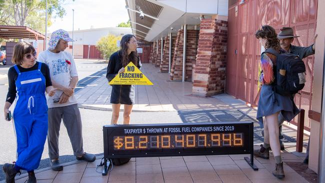 The environmental protest that greeted both the Labor and Liberal campaigns in Alice Springs was not exactly the largest demonstration ever seen on the campaign trail. Picture: Jason Edwards