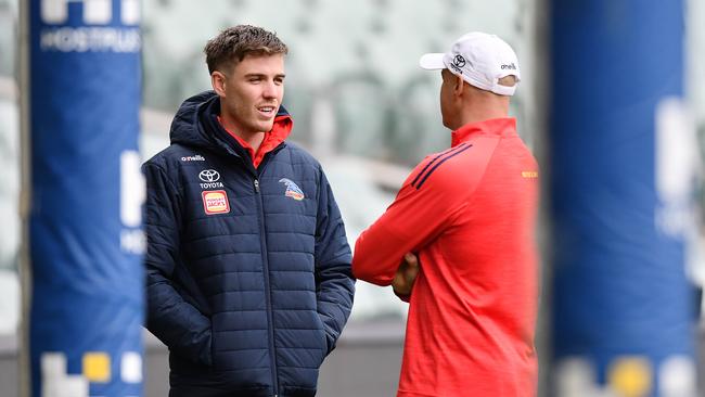 Paul Seedsman chats to Matthew Nicks during Crows training in June. Picture Mark Brake