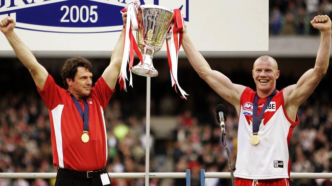 Paul Roos and Barry Hall with the premiership cup in 2005.