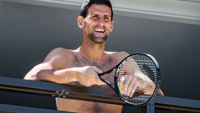 Novak Djokovic on his balcony during Adelaide quarantine. Picture: AFP Images 