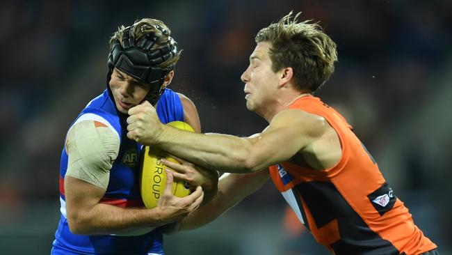 Toby Greene strikes Caleb Daniel in Round 6. Picture: AAP