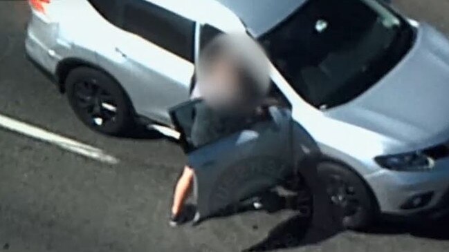 Gray attempts to car jack another motorist before jumping into the river. Picture: Queensland Police Service