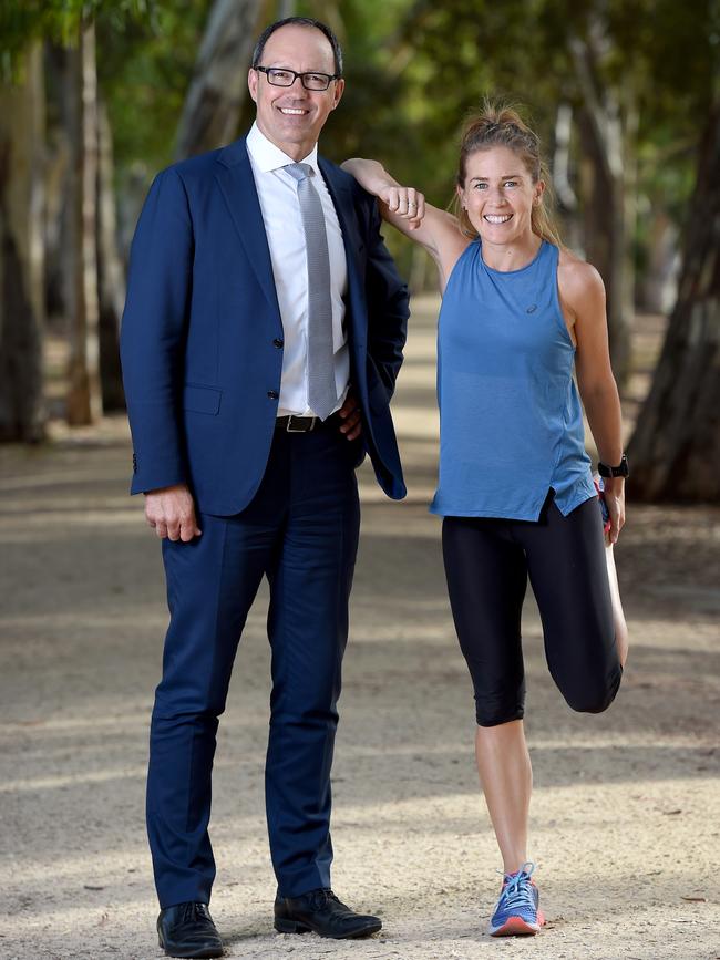 Sports Minister Corey Wingard with Adelaide marathon star Jess Trengove at the start of the uni loop in North Adelaide. Picture: Naomi Jellicoe