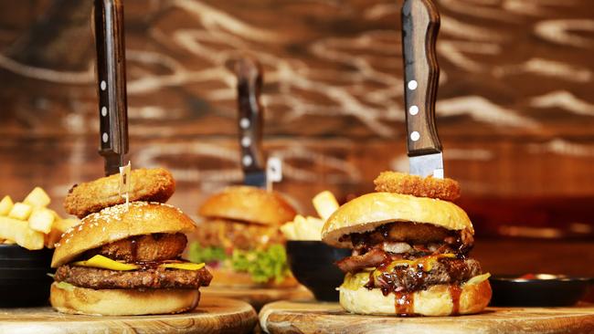 High stakes: The Captain Jack burgers...the vegan one has the flag; the real meat one is on the right.  Picture: Braden Fastier