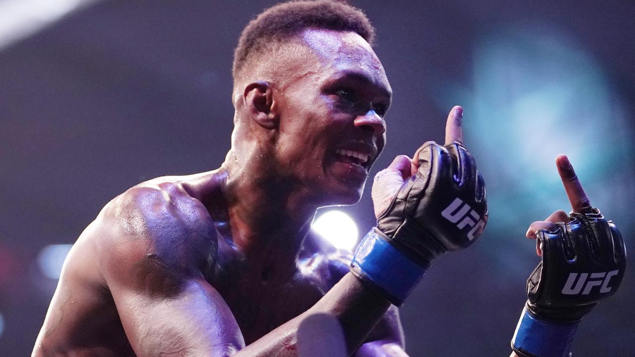 Israel Adesanya of New Zealand gestures to his next opponent after winning against Robert Whittaker of Australia during UFC 243 at Marvel Stadium in Melbourne, Sunday, October 6, 2019. (AAP Image/Michael Dodge) NO ARCHIVING,EDITORIAL USE ONLY