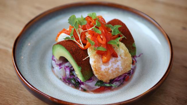 Ceviche of seasonal fish, fried egg, avocado and cabbage salad at Nomada. Picture: Rebecca Michael