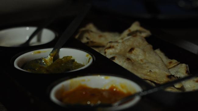 The condiment platter ($9) of naan with three specialty dips is a great place to start.