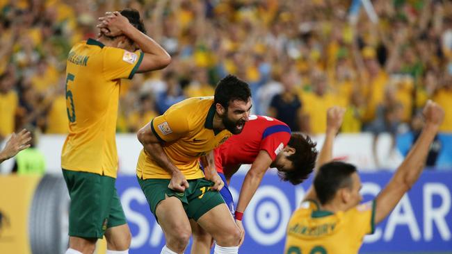 Australia's Mile Jedinak can’t believe it. Pic: Brett Costello.