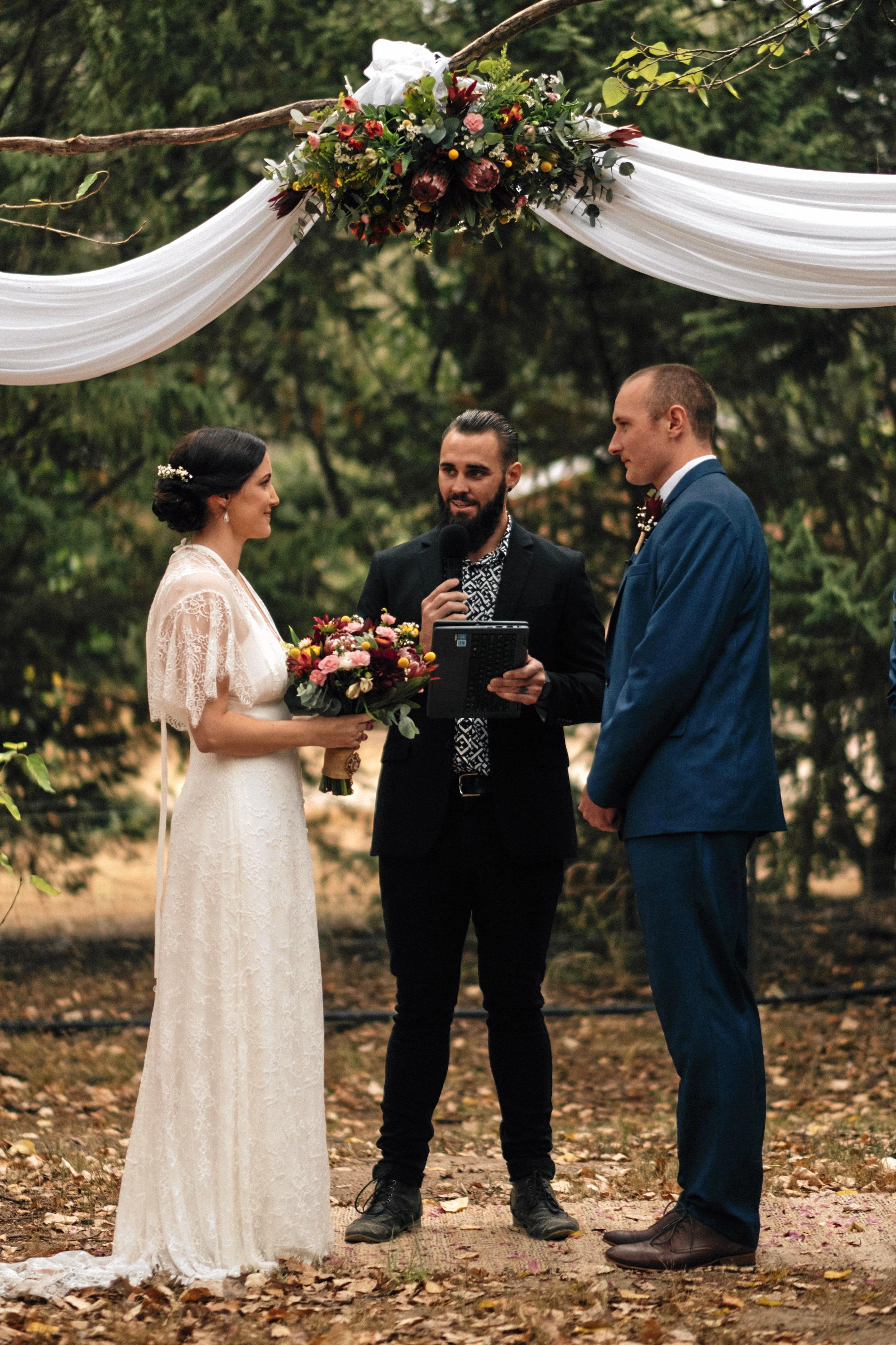 The couple held their ceremony at the grounds of the Honeysuckle Cottages surrounded by 120 friends and family. Picture: Richard Grainger Photography