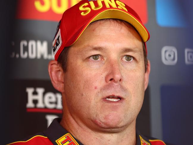 GOLD COAST, AUSTRALIA - APRIL 12: Head coach Stuart Dew speaks to media during a Gold Coast Suns AFL training session at Heritage Bank Stadium on April 12, 2023 in Gold Coast, Australia. (Photo by Chris Hyde/Getty Images)