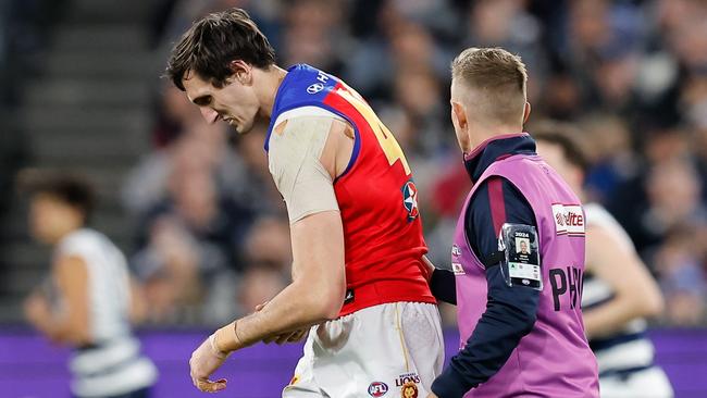 MELBOURNE, AUSTRALIA - SEPTEMBER 21: Oscar McInerney of the Lions is seen injured during the 2024 AFL Second Preliminary Final match between the Geelong Cats and the Brisbane Lions at The Melbourne Cricket Ground on September 21, 2024 in Melbourne, Australia. (Photo by Dylan Burns/AFL Photos via Getty Images)