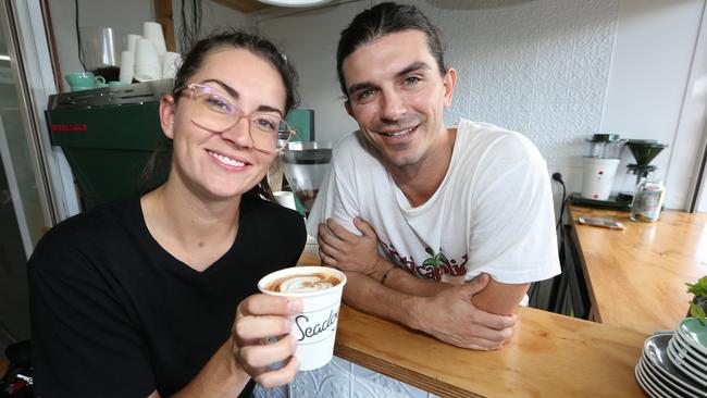 Seadog owner Brodie Green with Taylor Zimmer who came in for a free coffee. Photo: Mike Batterham