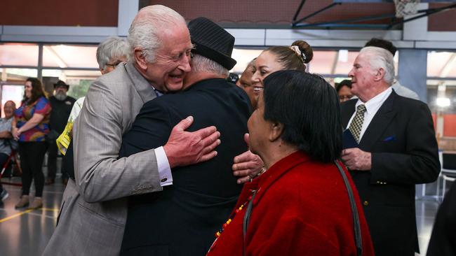 King Charles receives a hug during a visit to the National Centre of Indigenous Excellence in Sydney. Picture: AFP