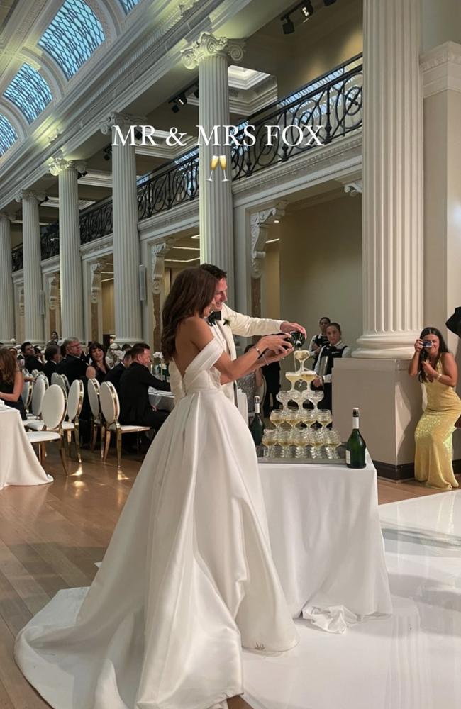 The couple with a champagne tower. Picture: Instagram