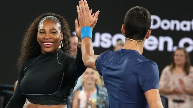 Serena Williams with Novak Djokovic on Rod Laver Arena. Picture: Michael Klein