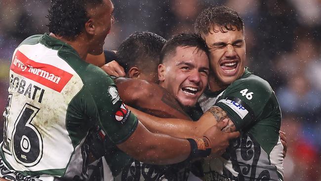 SYDNEY, AUSTRALIA - FEBRUARY 12: Kodi Nikorima of the Maori All Stars celebrates with his team mates after scoring a try during the match between the Men's Indigenous All Stars and the Men's Maori All Stars at CommBank Stadium on February 12, 2022 in Sydney, Australia. (Photo by Mark Kolbe/Getty Images)