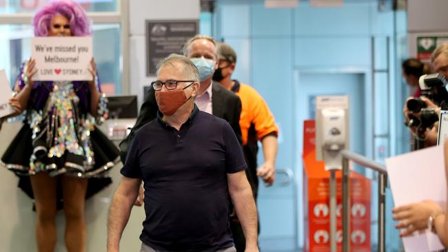 Passengers emerge from a Melbourne to Sydney flight this morning. Picture: Damian Shaw