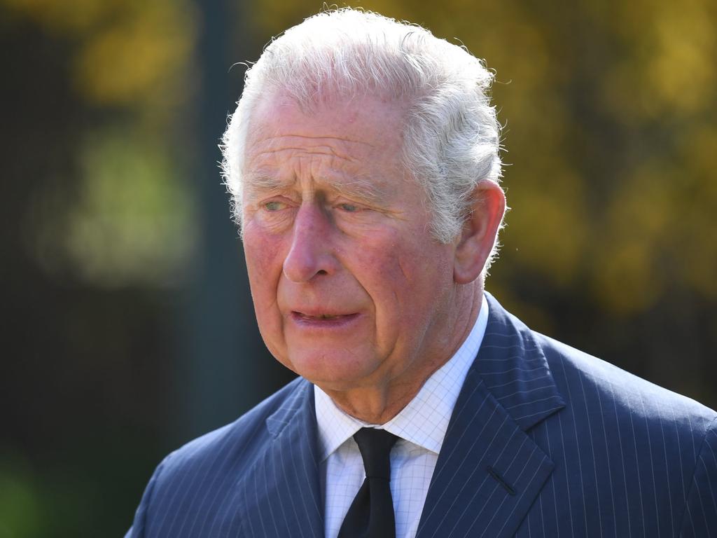 The grieving prince looked sad as he looked at the messages left for his beloved father, Prince Philip. Picture: Jeremy Selwyn - WPA Pool/Getty Images