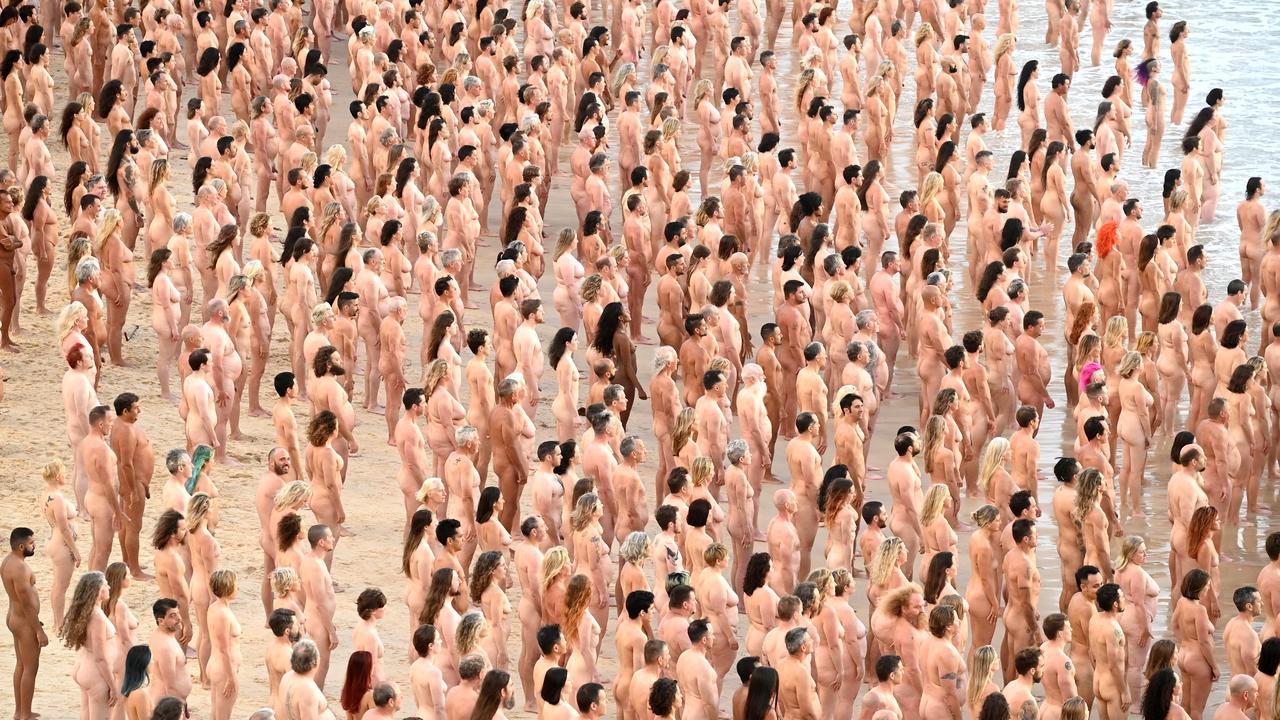 Sydney-siders strip bare naked at Bondi Beach this morning for a Spencer Tunick photograph Picture: NCA NewsWire / Jeremy Piper