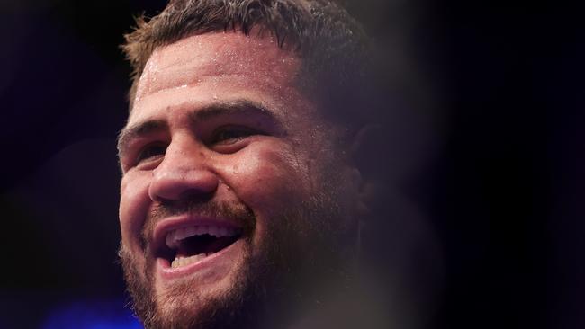 LAS VEGAS, NEVADA - DECEMBER 11: Tai Tuivasa of Australia celebrates his knockout victory over Augusto Sakai of Brazil during their heavyweight fight during the UFC 269 event at T-Mobile Arena on December 11, 2021 in Las Vegas, Nevada. Carmen Mandato/Getty Images/AFP == FOR NEWSPAPERS, INTERNET, TELCOS &amp; TELEVISION USE ONLY ==